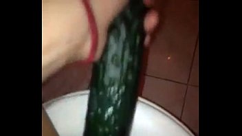 doll masturbathing with cucumber